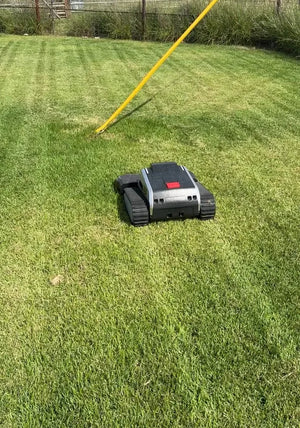 Lymow One Plus mowing a lawn, photo attached to Matthew Nowosiadly's review
